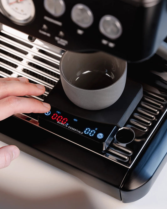 Mini coffee scale from Barista Essentials on Sage Barista Express with cappuccino cups