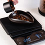 Koffie weegschaal en vacuum bewaarbus