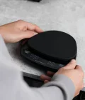 Smart coffee scale in hands barista-essentials
