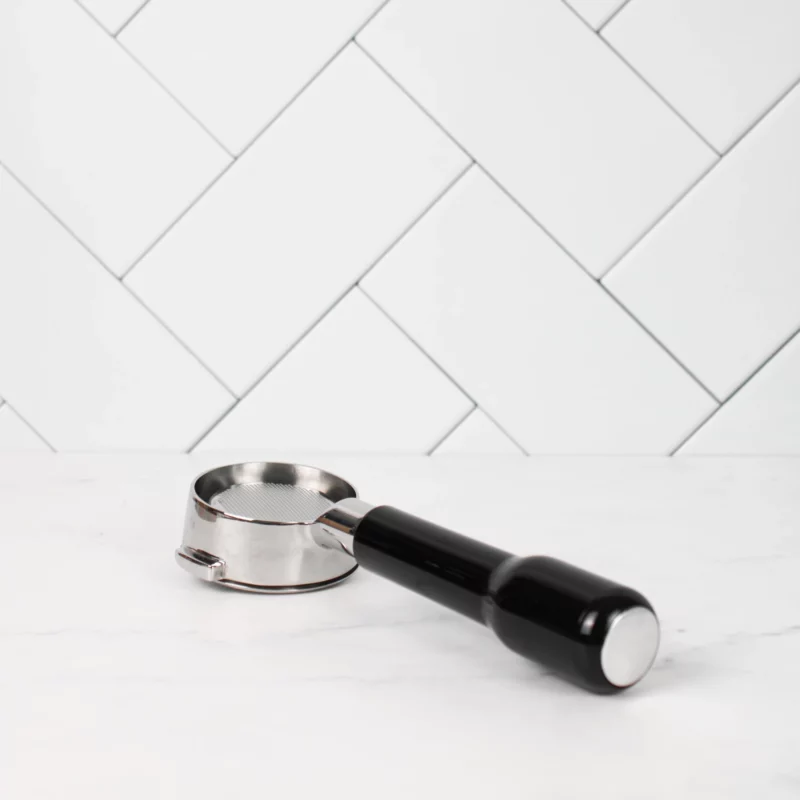 bottomless portafilter mm E black kitchen counter