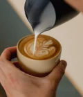 Pouring Latte art in Latte coffee cup vanilla yellow by Barista-Essentials