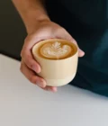 Latte art in Latte coffee cup vanilla yellow by Barista-Essentials