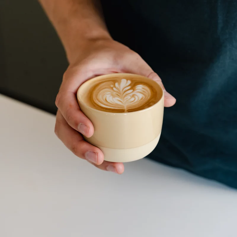 Latte art in Latte coffee cup vanilla yellow by Barista-Essentials