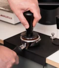 Calibrated spring loaded tamper  in use 58.5mm E61 Barista-Essentials